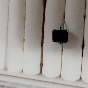 Sterling silver stamped 925 tested black onyx black diamond chips accent.